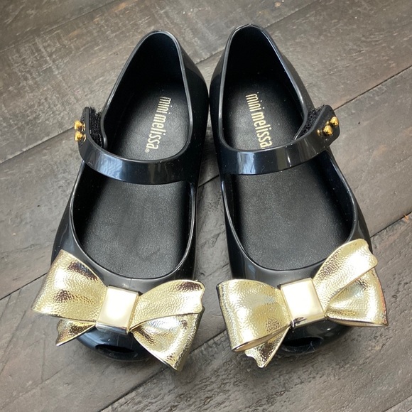 Mini Melissa Other - Mini Melissa - black shoes with golden bow
